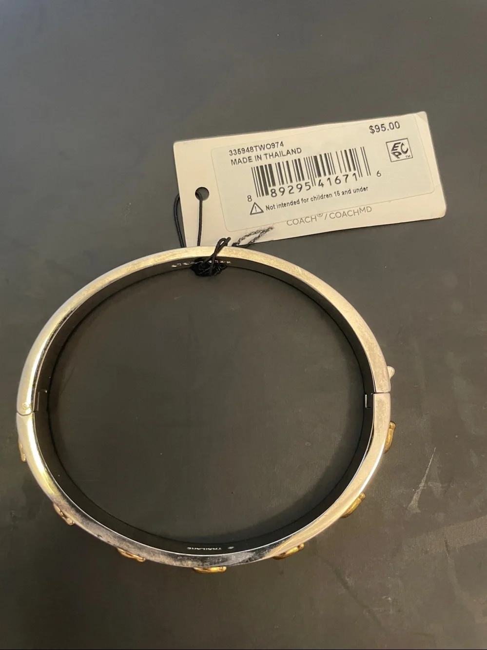 Coach polished silver